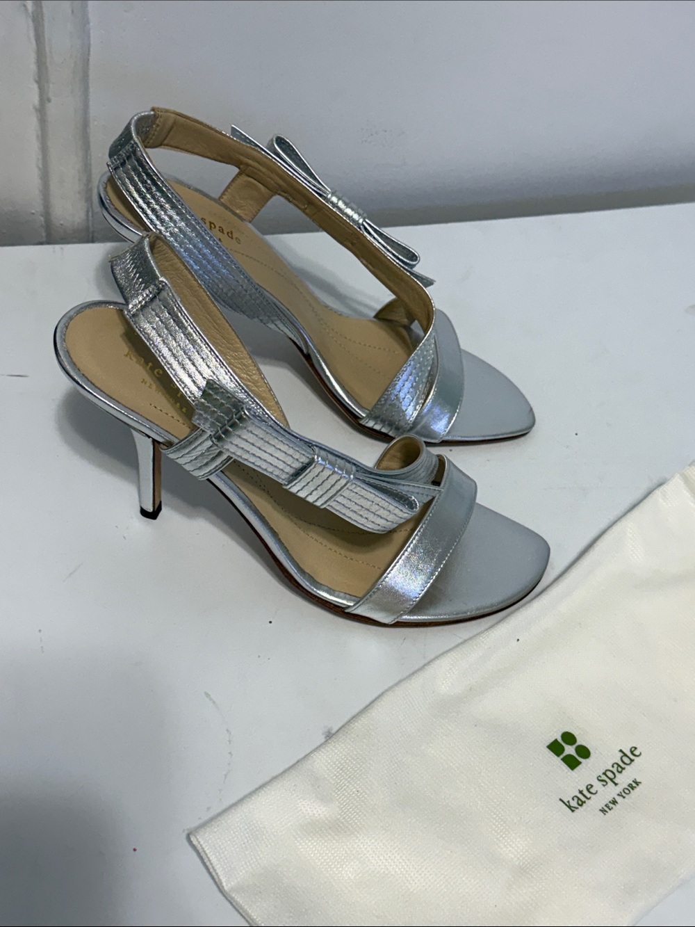 kate spade Silver Metallic Bow Slingback Heels